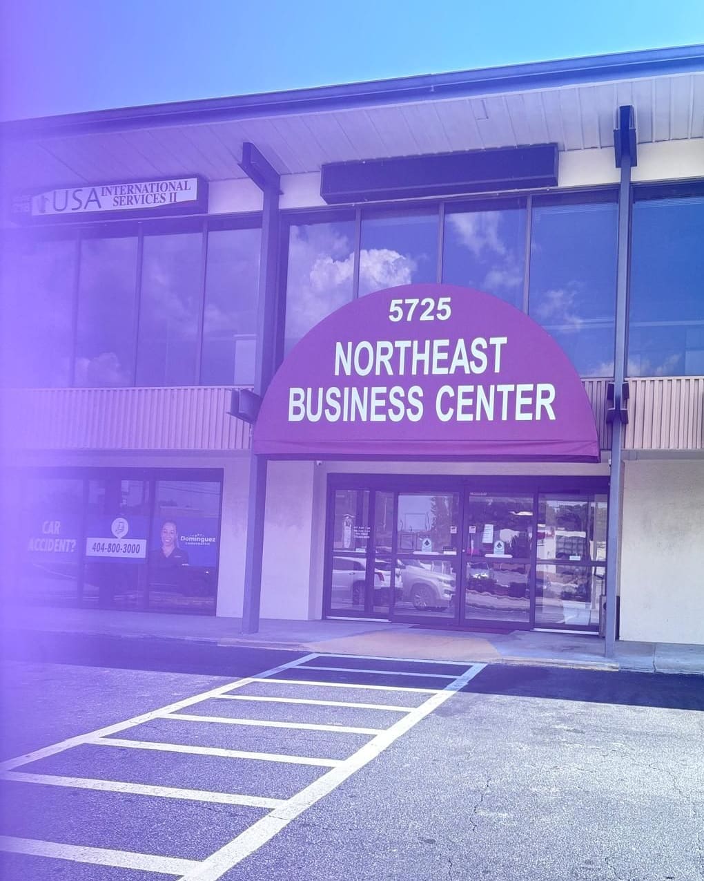 The entrance to the Northeast Business Center at 5725 Buford Hwy NE, seen from the car park